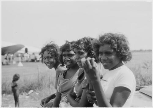Four teenage girls at the aerodrome, Mornington Island, Queensland, approximately 1980 / Gregory Owen