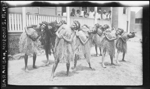 Aboriginal women dancing in grass dresses and headbands at Barambah, Queensland, 2 December 1930