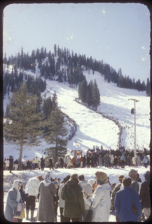 View of a ski run with spectators looking on, Olympic Winter Games, Squaw Valley, California 1960 [transparency] / Donald Maclurcan