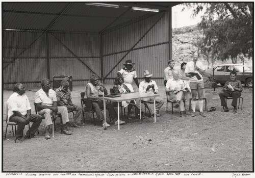 Ernabella elders meet with the Minister for Aboriginal Affairs, Clyde Holding, and Charles Perkins of the Department of Aboriginal Affairs, Ernabella, South Australia, April 1987 / Joyce Evans
