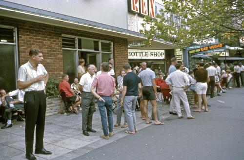 Patrons outside the Rex Hotel, Macleay Street, Kings Cross, Sydney, 1964 [picture] / Robin Smith