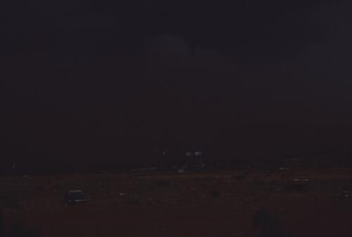 Storm over Papunya, Northern Territory, 1983 [transparency] / Andrew Crocker