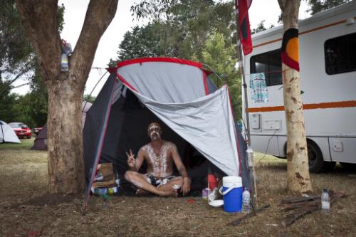 Aboriginal man sitting inside a tent during the 40th anniversary of the Aboriginal Tent Embassy in Canberra, 26 January 2012 [picture] / Jodie Harris
