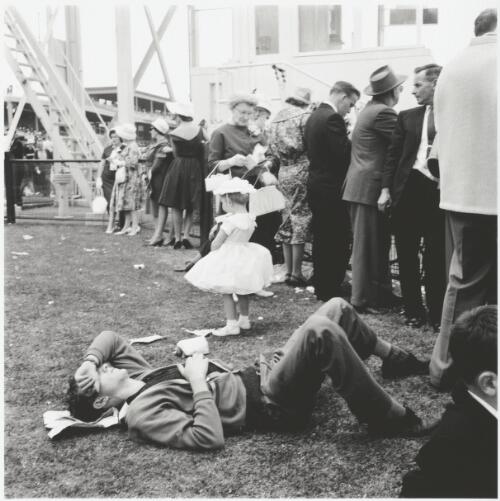 Asleep at the races, Melbourne Cup, Flemington, ca. 1965 [picture] / Maggie Diaz