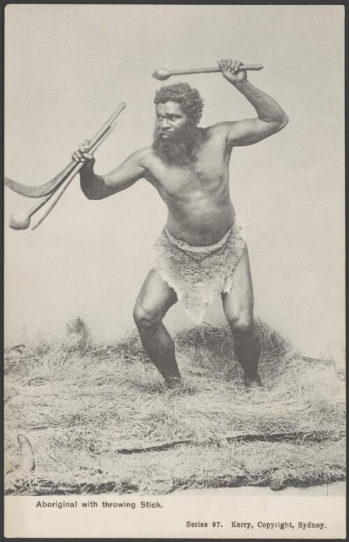 Studio portrait of an Aboriginal man holding boomerangs, clubs and wearing a fur loin cloth, Sydney, ca. 1895 [picture] / Kerry