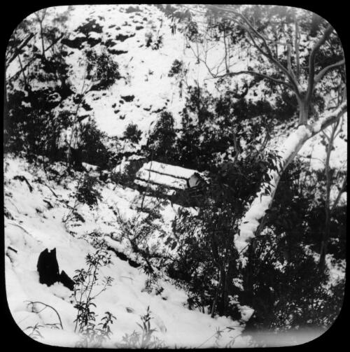 A snow covered hut in a gully, Victoria, approximately 1920 / Robert Wilkinson