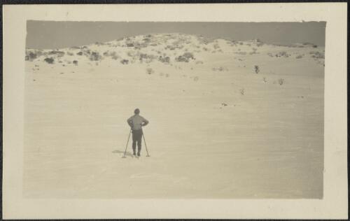 A lone skier facing Mount Cope, Victoria, approximately 1920 / Robert Wilkinson