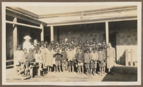 Aboriginal youth and children with Matron outside Koonibba Children's Home, South Australia, probably 1926