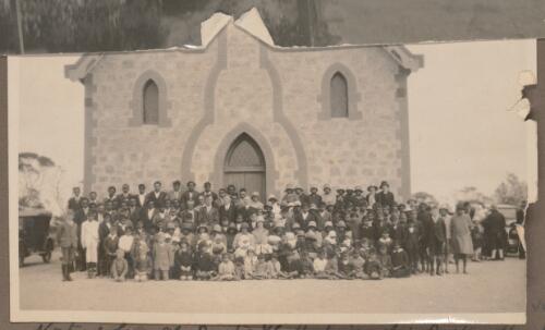 Koonibba community gathered outside the church for Pastor C. Hoff's farewell and Pastor Albert Meuller's installation, Koonibba Mission Station, South Australia, 1930