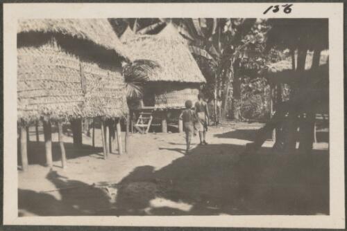 Village huts, New Britain Island, Papua New Guinea, probably 1916