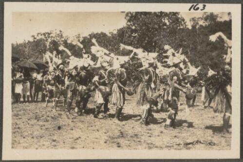Tolai dancers with tom-toms, Rabaul, Papua New Guinea, probably 1916