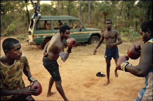 Four men boxing at Yatalamarra Homeland near Ramingining, Northern Territory, 2010 / Matthew Abbott