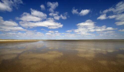 Cloud reflections in Lake Eyre South, South Australia, 2012 / Trevern Dawes