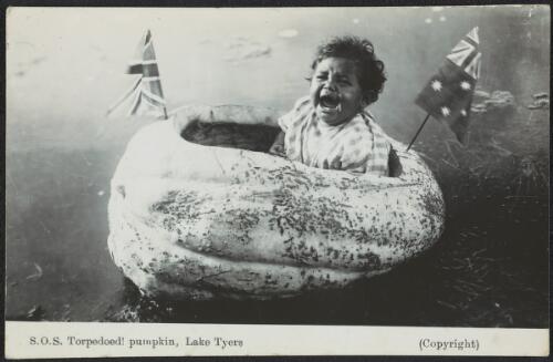 Aboriginal child in a homemade pumpkin boat, Lake Tyers, Victoria