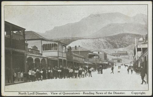 People standing in the street reading news of the North Mount Lyell mine disaster, Queenstown, Tasmania, 1912