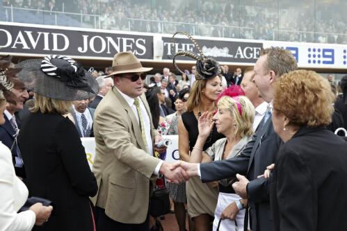 Peter Moody greeting Black Caviar owners Jill Taylor, Kerrin Wilkie and Gary Wilkie after the historic race win at the Caulfield Cup, Caulfield Racecourse, Victoria 2011 / Tanja Milbourne