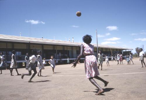 School students playing a ball game at Derby District High School, Derby, Western Australia, 1961 / Robin Smith