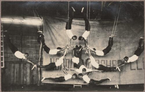 Acrobatic performance on trapeze at the internment camp at Holsworthy, New South Wales, 1918 or 1919 / Carl Schiesser