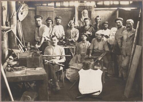 Group of men in a workshop at the internment camp at Holsworthy, New South Wales, 1918 or 1919 / Carl Schiesser