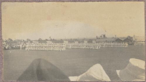 Distant view of internees marching on the parade ground at the internment camp at Holsworthy, New South Wales, 1918 or 1919 / Carl Schiesser