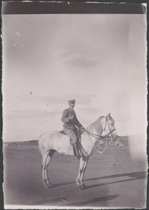 Officer on horseback, Cape Colony, South Africa, approximately 1900  / Samuel White
