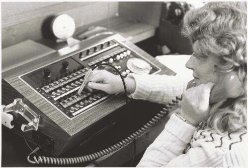 Blind telephone operator using special switchboard, Sydney, 1974 / Douglas Thompson