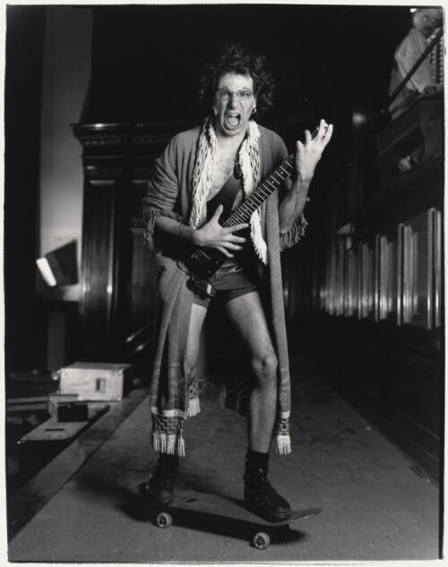 Carl Polke, Circus Oz performer, with guitar and skateboard, Melbourne, 1997 / Jim Rolon