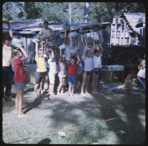 Alex Hood singing his song about Pumpkin Paddy with children in Advancetown, Queensland, 1970