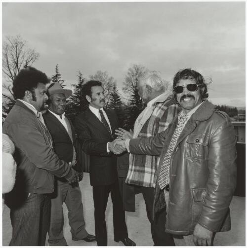 Charles Perkins shaking hands with members of the National Aboriginal Congress, Canberra, 1978 / Mervyn Bishop