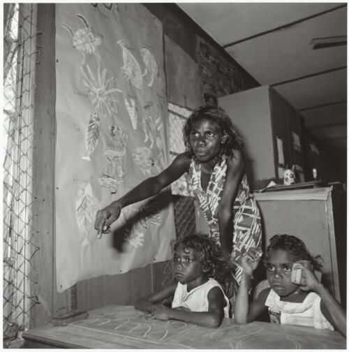 An Aboriginal school teacher and two children, Maningrida community, Arnhem Land, Northern Territory, 1975 / Mervyn Bishop
