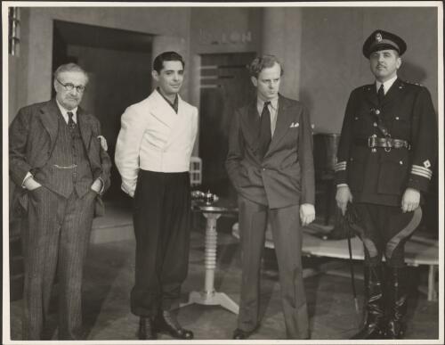 Four unidentified male actors in the J.C. Williamson production of Idiot's delight, 1939 [picture] / C.J. Frazer