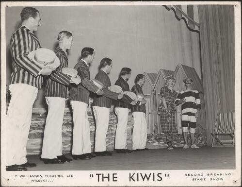 Line of men, Phil Jay, Stan Wineera and unknown performer in the J.C. Williamson presentation of The Kiwis, 1953 [picture] / [Hal Willaimson]