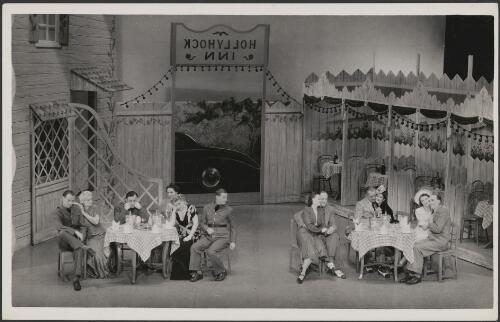 Principals and cast in the J.C. Williamson production of Let's face it, scene at the Hollyhock Inn gardens, 1943 [picture] / S.J. Hood