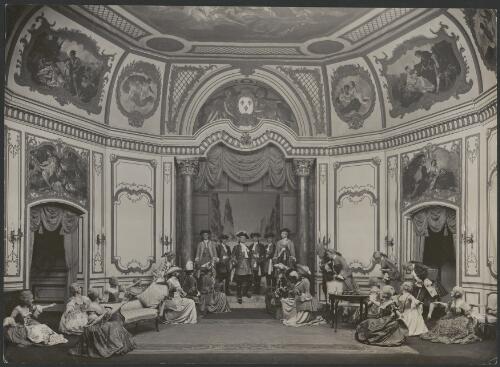 Bertram Wallis as King Louis XV and chorus in the London production of Madame Pompadour, act 2, the Pompadour's apartments at Versailles, ca. 1924 [picture] / Stage Photo Coy., London