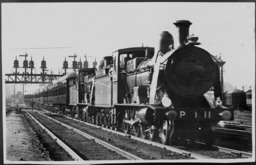 [1920 royal train, two blue P class engines, leaving Sydney terminal] [picture] / G. H. Eardley