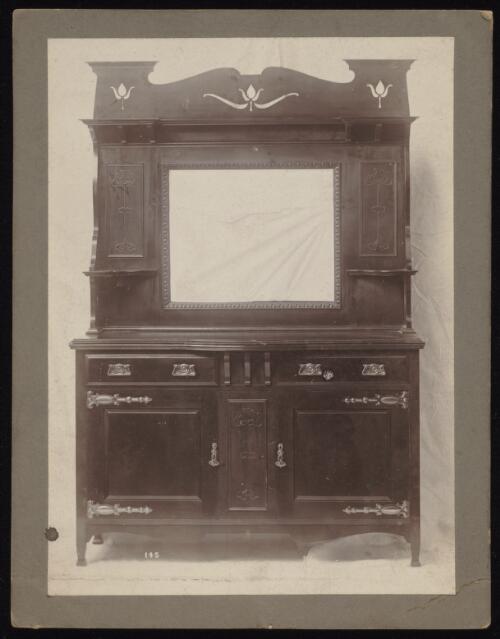 Wood carved wall cabinet on display, Sydney?, approximately 1890