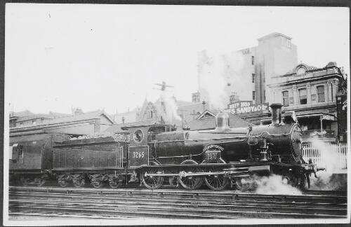 The red steam locomotive 3265 named the 'Hunter' at the Newcastle railway station, 1934 [picture] / John Buckland