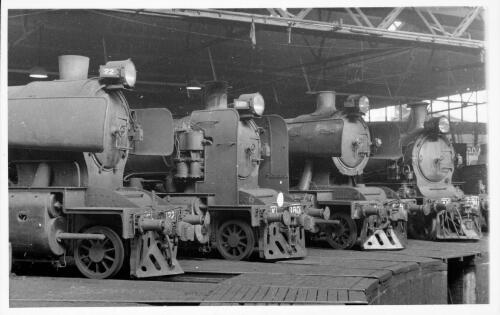 [Locomotives 22, 180, 515 and 691 stabled on B table, North Melbourne, Victoria, 10 June, 1956] [picture] / John L. Buckland