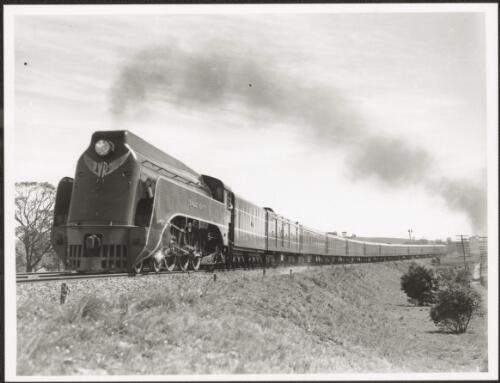 Locomotive S302 (Edward Henty) hauling southbound Spirit of Progress near Heathcote Junction, Victoria, March 1939 [picture] / John Buckland