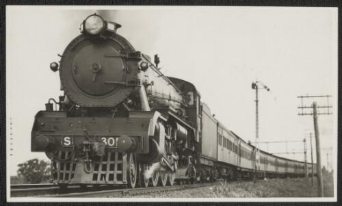 Locomotive S301 (unstreamlined and no smoke deflectors) hauling an Albury bound passenger train near Broadmeadows, Victoria, ca. 1930s [picture] / John Buckland