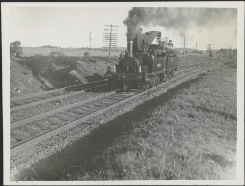 No. 3 and crane tender travelling north to clear the wreckage of a collision at Seymour, Heathcote Junction, Victoria, September 1935 [picture]