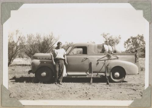 Ian McRae standing next to a ute, Gosses Bluff, Northern Territory, ca. 1946 [picture]