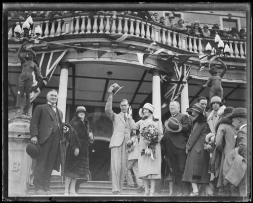 Duke and Duchess of York waving to crowds from the steps of the Carrington Hotel during their royal tour, Katoomba, New South Wales, 1927 [picture]