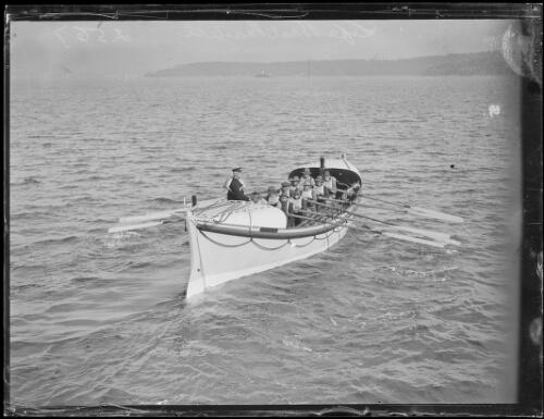 Volunteer crew rowing the Watsons Bay lifeboat Alice Rawson under the direction of Captain Charles Pike on Sydney Harbour, New South Wales, May 1930, 1 [picture]