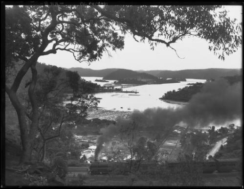 General view of Hawkesbury River with train in foreground, New South Wales, 2 [picture] / Frank Hurley