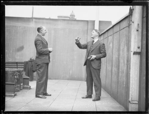 Billiard players William Smith and Walter Lindrum tossing a coin, New South Wales, ca. 1930 [picture]