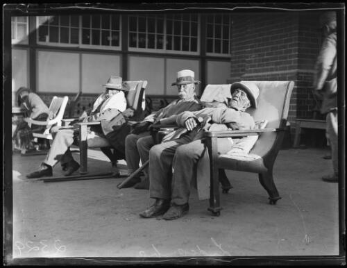 Residents sitting outside Lidcombe Old Men's Home, New South Wales, 18 July 1931, 2 [picture]