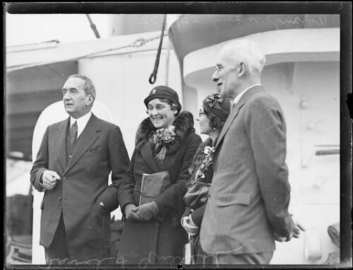 Stanley Bruce and Henry Gullet with their wives sailing to New Zealand on the ship Aorangi, New South Wales, 24 June 1932 [picture]