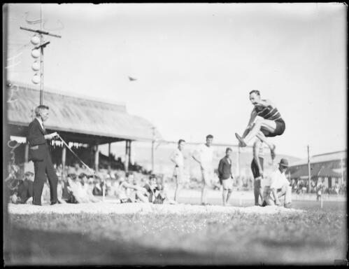 Athlete F.H. Hook long jumping, New South Wales, ca. 1945, 1 [picture]