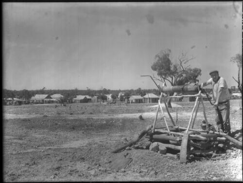 [Well on the edge of a settlement, Central Australia] [picture] / [Frank Hurley]